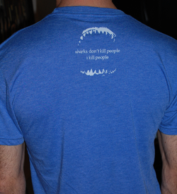 Super soft triblends shirt with great white shark jaws on the back with the words 